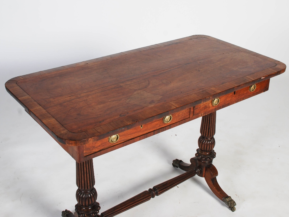 A 19th century rosewood centre table, the rounded rectangular top above two frieze drawers backed by - Image 4 of 6