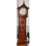 An early 19th century mahogany and ebony lined longcase clock, the circular enamelled dial with