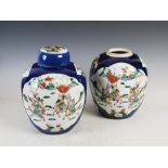 A pair of Chinese porcelain powder blue ground famille verte jars and one cover, Qing Dynasty,