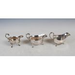 Three assorted silver sauce boats, one 18th and two 20th century, comprising; a George III sauce