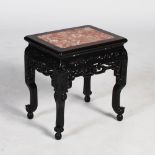 A Chinese dark wood jardiniere stand, Qing Dynasty, the rectangular top with a mottled red and white