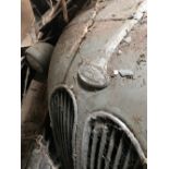 A vintage Ford 103E Popular, circa 1950's, Barn Find condition probably not moved in over fifty