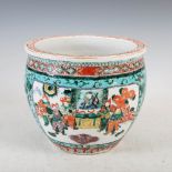 A Chinese porcelain jardiniere / fish bowl, Qing Dynasty, decorated with famille verte and rose