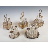 A collection of five assorted 19th century electroplated cruet sets, comprising: three four bottle