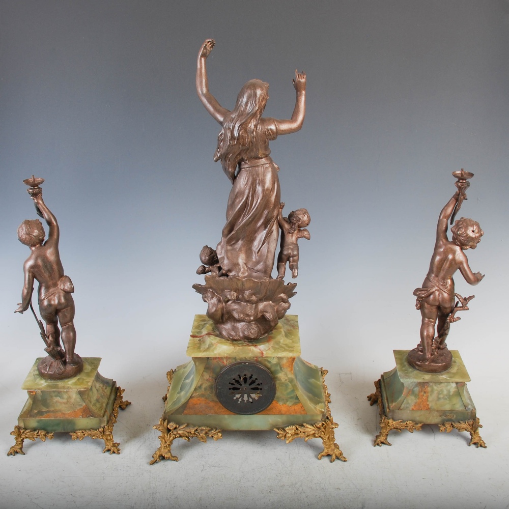 A late 19th/ early 20th century spelter, onyx and champleve enamel clock garniture, the clock with - Image 3 of 20