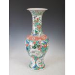 A Chinese porcelain famille verte baluster shaped vase, Qing Dynasty, decorated with panels of deer,