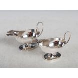 A pair of George V silver sauce boats, Birmingham 1927, makers mark S.B. & S. LTD, 16cm long, 6.9