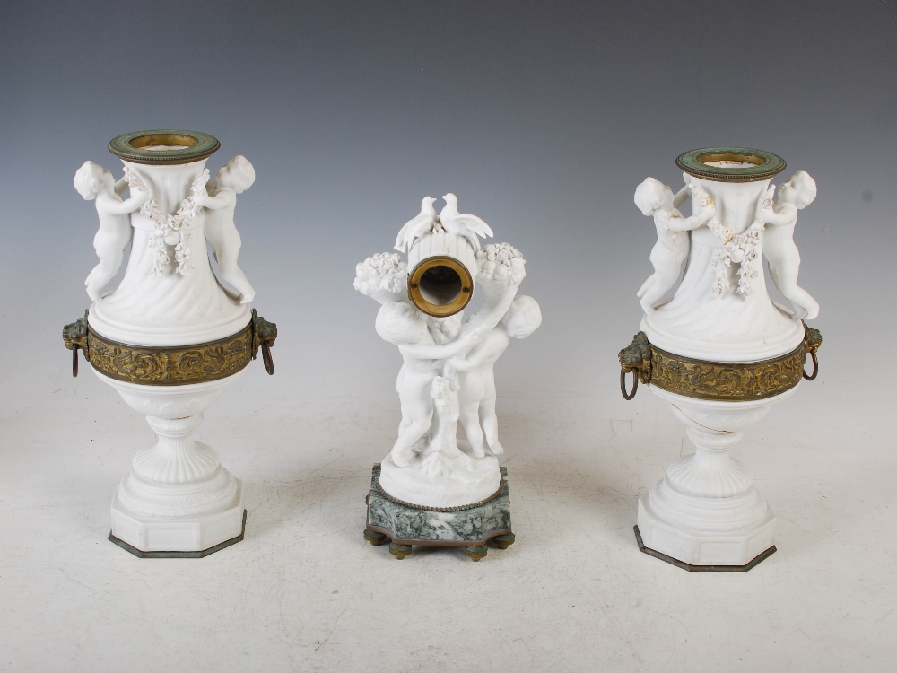 A late 19th/ early 20th century bisque porcelain, onyx and gilt metal clock garniture, the - Image 3 of 16