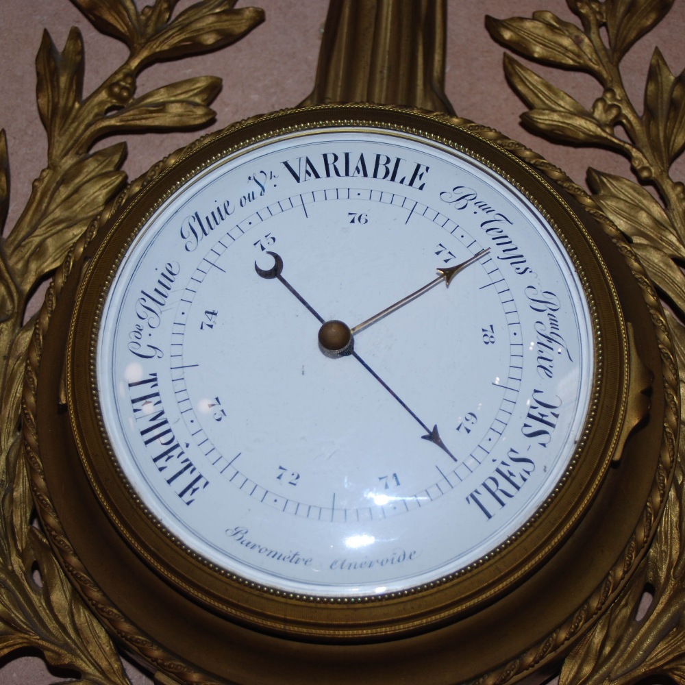 A late 19th/ early 20th century French gilt metal wall clock and matching barometer, both with white - Image 6 of 10