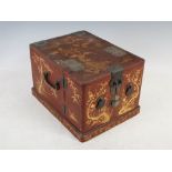 A Japanese lacquer travelling vanity box, Meiji Period, the hinged cover opening to a reveal a