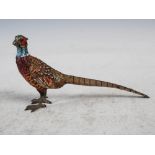 An early 20th century cold painted bronze figure of a cock Pheasant, 7cm high x 15cm long.