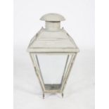 A 19th century painted metal and glass lantern, with four tapered rectangular glass panel sides, one