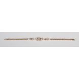 An early 20th century rose and white metal pearl and diamond centrepiece bracelet, set with a