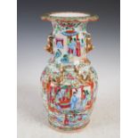 A Chinese porcelain famille rose Canton vase, Qing Dynasty, decorated with circular, rectangular and