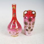 Two late 19th century peach blow glass vases, comprising: a bottle vase with gilded foliate scroll