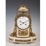 A 19th century gilt metal and white marble mounted mantel clock in the Neo Classical style, the