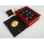 The London Mint, Magnificent Seven, seven-coin collection, comprising: United Kingdom sovereign