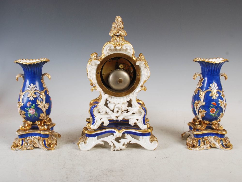 A 19th century French porcelain Rococo style clock garniture, Ed Honore, A, Paris, the mantel - Image 3 of 13