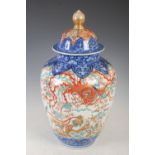 A Japanese Imari jar and cover, late 19th/early 20th century, decorated with phoenix and dragons