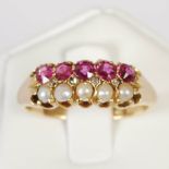 An 18ct gold, ruby, diamond and split pearl ring, set with a central line of four rose cut