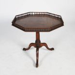 A George III mahogany octagonal shaped bird cage occasional table, the hinged octagonal top with a