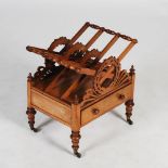 A 19th century mahogany Canterbury, the rectangular top with four X-frame divisions with laurel