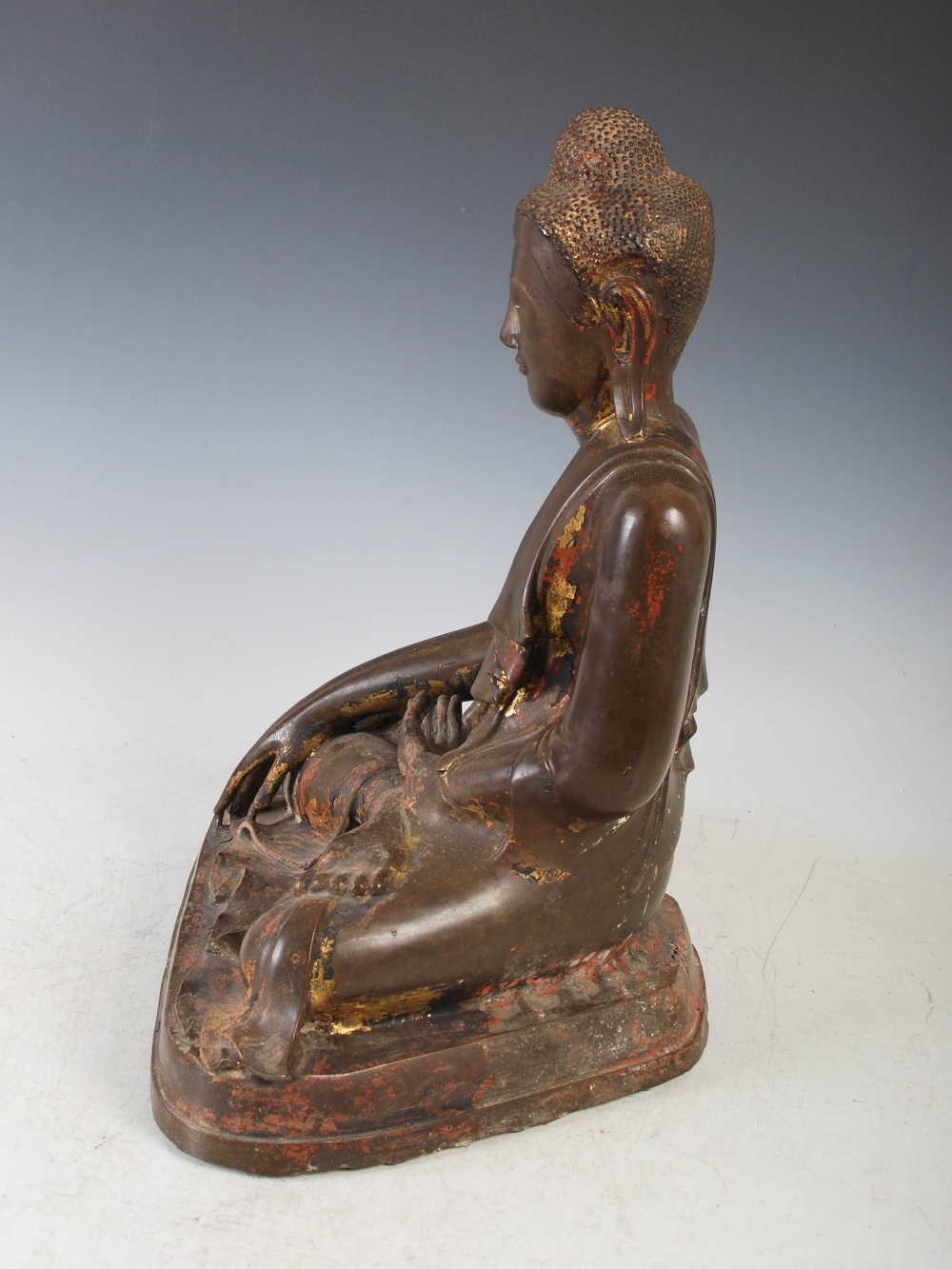 A 19th century gilt bronze figure of Buddha, Mandalay Period, modelled in varjrasana, on later - Image 5 of 13