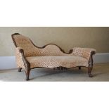 A Victorian mahogany chaise longue, the contemporary upholstered back and seat raised on foliate and