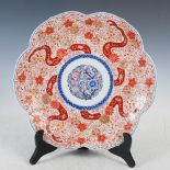 A Japanese Imari porcelain leaf shaped charger, late 19th/early 20th century, decorated with