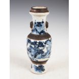 A Chinese porcelain blue and white crackle glazed vase, Qing Dynasty, decorated with continuous