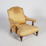 A Victorian mahogany armchair, the upholstered back, arms and seat raised on tapered cylindrical