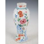 A Chinese porcelain famille rose octagonal shaped jar, Qing Dynasty, decorated with a fenced