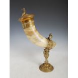 A large and ornate late 19th century European gilt metal mounted horn table centrepiece, on scroll