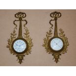 A late 19th/ early 20th century French gilt metal wall clock and matching barometer, both with white