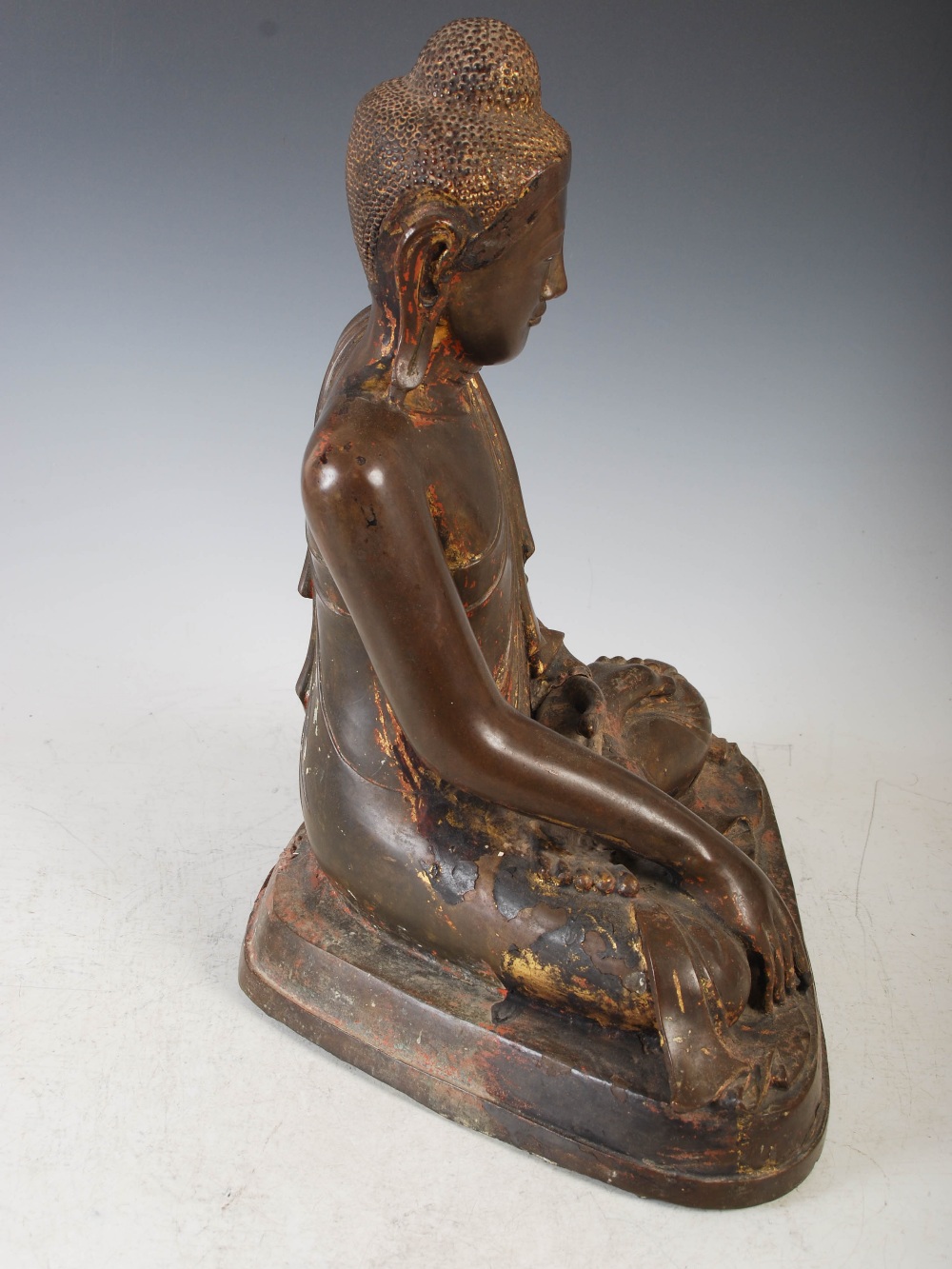 A 19th century gilt bronze figure of Buddha, Mandalay Period, modelled in varjrasana, on later - Image 7 of 13