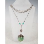 An Arts & Crafts aventurine, chalcedony, red paste and white metal mounted pendant and necklace, the
