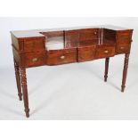 An early 19th century Scottish mahogany sideboard, the stage back centred with a rectangular