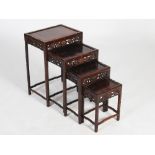 A quartetto of Chinese dark wood occasional tables, late 19th/early 20th century, the panelled