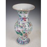 A Chinese porcelain famille rose vase, late 19th/ early 20th century, decorated with panels of court