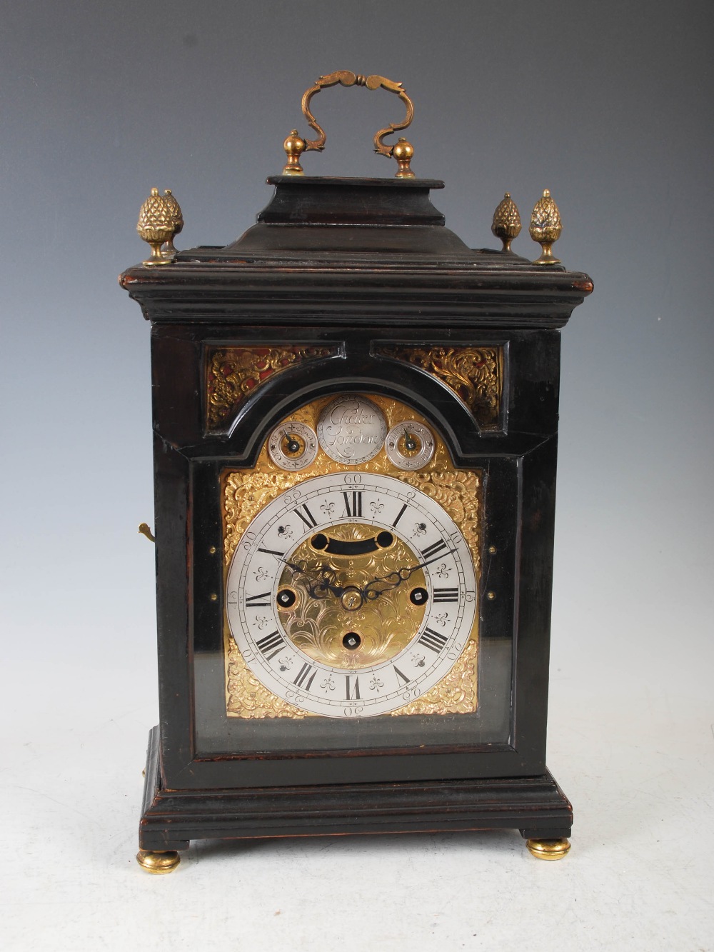 An ebonised bracket clock, Cheiter, London, the brass dial with silvered chapter ring bearing Arabic