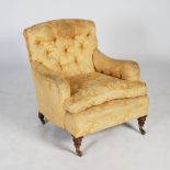 A late 19th century walnut armchair, Howard & Sons, Ltd, London, with button down upholstered