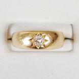 A late 19th century 18ct gold single stone diamond gypsy ring, set with an old cushion cut