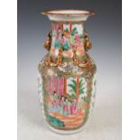 A Chinese porcelain famille rose Canton vase, Qing Dynasty, decorated with rectangular shaped panels