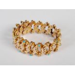 A yellow metal split pearl and turquoise expandable bracelet, stamped 9ct, 14.2 grams.