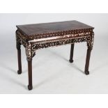 A Chinese dark wood and mother of pearl inlaid centre table, Qing Dynasty, the panelled