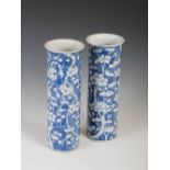 A pair of Chinese porcelain blue and white sleeve vases, Qing Dynasty, decorated with prunus blossom