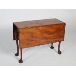 An Irish George III mahogany drop leaf table, the rectangular top with twin drop leaves, raised on