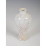A small Chinese porcelain crackle glazed Meiping vase, Qing Dynasty, 13.5cm high.