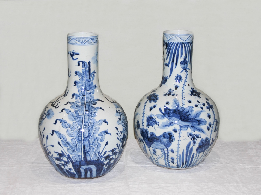 A pair of decorative Chinese blue and white porcelain bottle vases, decorated in the Ming style with - Image 2 of 13