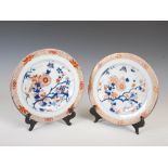 A near pair of Chinese porcelain Imari plates, Qing Dynasty, decorated with prunus blossom,